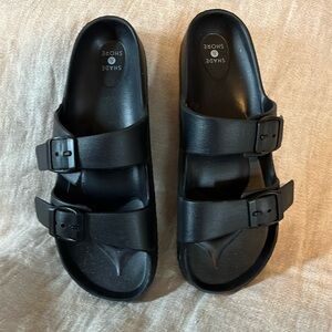 Women’s black slide sandals. Size 9